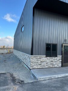 Modern building featuring mountain stack stone siding