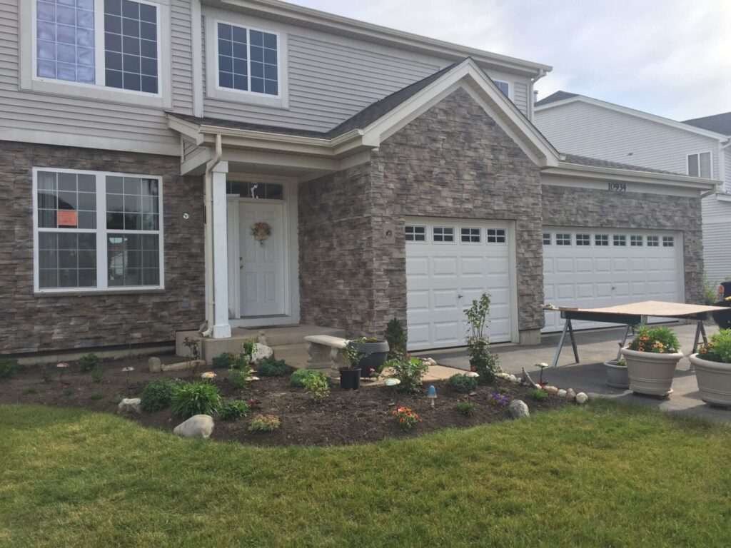 House featuring Security-Luebke's Mountain Stack Stone Siding