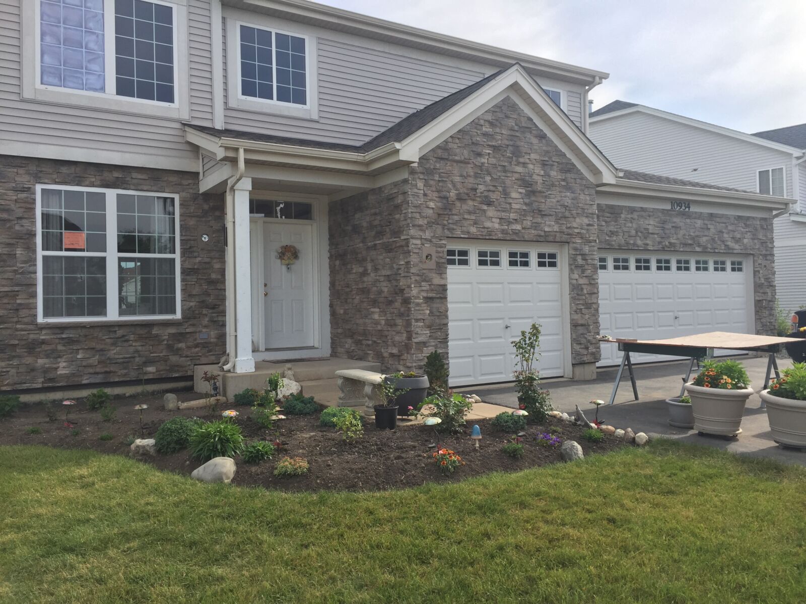 House featuring Security-Luebke's Mountain Stack Stone Siding